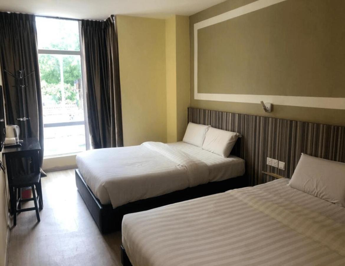 Sun Inns Hotel Айер Керо Екстериор снимка